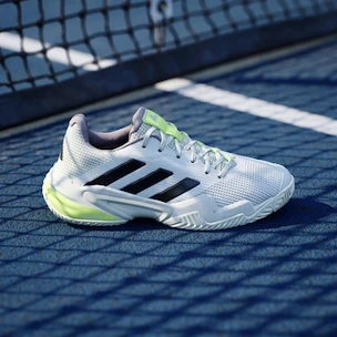 Ženska obutev za tenis adidas Barricade 13 W FTWWHT/CBLACK/CRYJAD